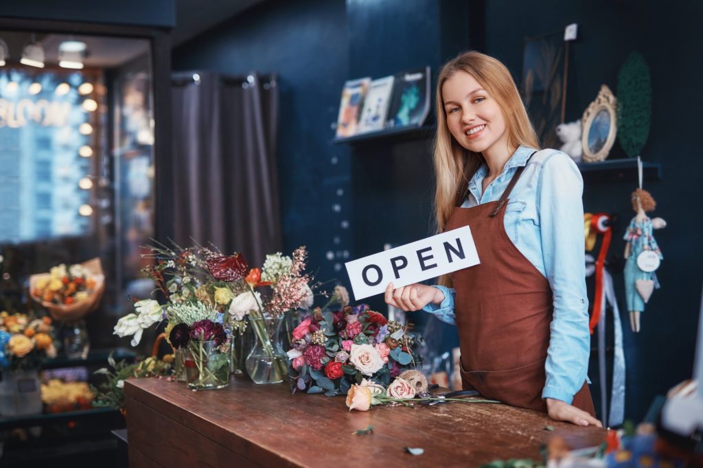 Young girl in a flower shop